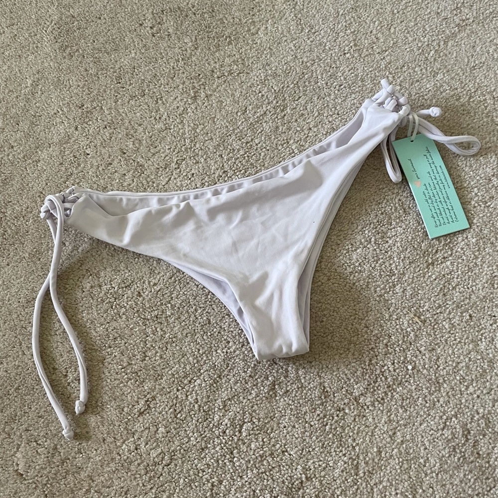 Kittenish cheeky light purple swim bottoms